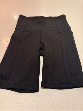 Athleta Black High-Rise Bike Shorts with Side Pockets